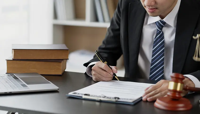 US attorney reviewing medical records and terminology for a personal injury case