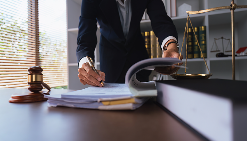 U.S. attorney reviewing medical records outsourced for a personal injury case
