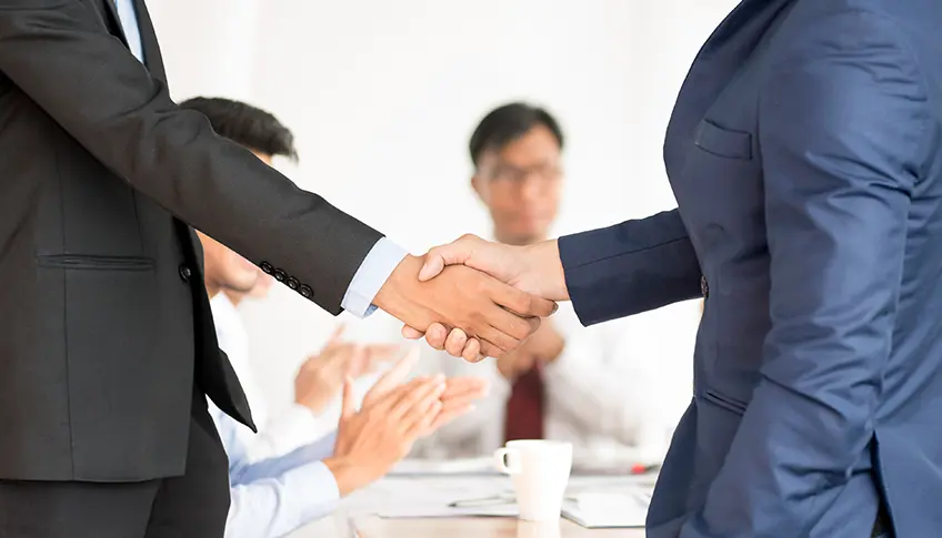 Attorneys in a settlement negotiation or mediation discussion
