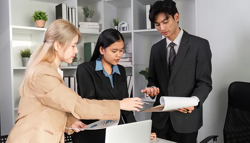 Legal team reviewing medical record review and chronology files for a US law firm