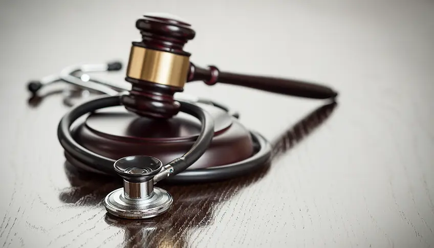 Stethoscope and gavel symbolizing the intersection of medical evidence and legal cases